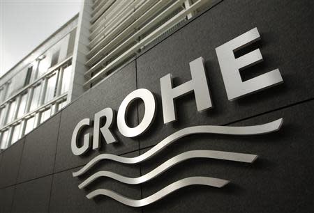 The logo of Grohe, Europe's biggest bathroom installations maker, is displayed at the entrance of their headquarters in Duesseldorf September 26, 2013. REUTERS/Ina Fassbender