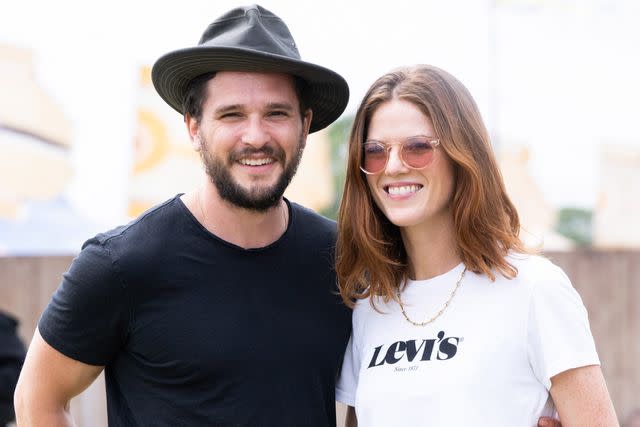 Samir Hussein/WireImage Kit Harington (left) stands next to his wife Rose Leslie (right) in June 2022