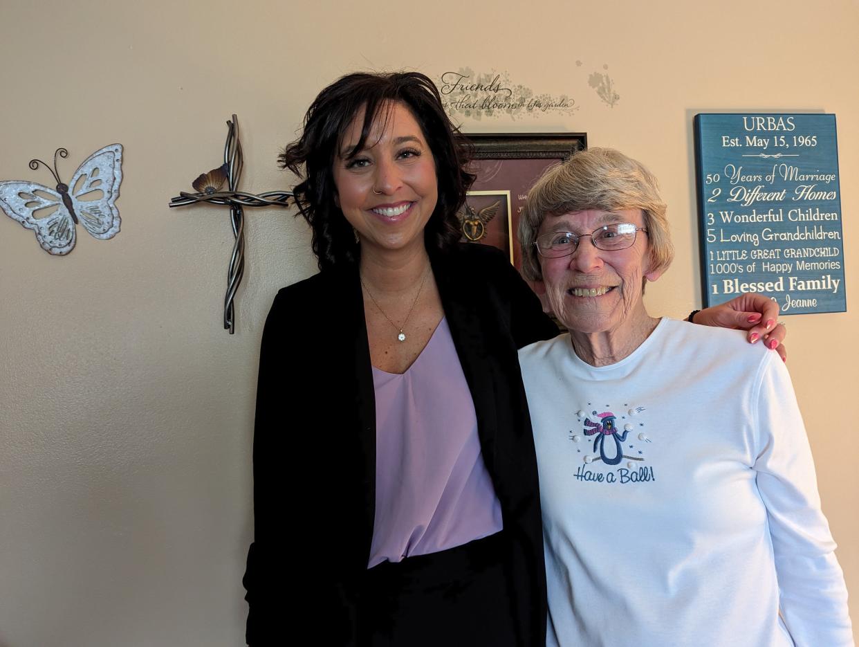 Lori Stern and her grandmother, Jeanne Urbas of Massillon, share how the family has focused on service to others after Urbas' son-in-law killed her daughter, granddaughter and himself in 2010. The family launched "I Choose Light," which ministers to the needy and raises money for charitable causes. The butterflies and cross on the wall of Tom and Jeanne Urbas' Massillon home are in memory of Ann and Grayce Blankenship.