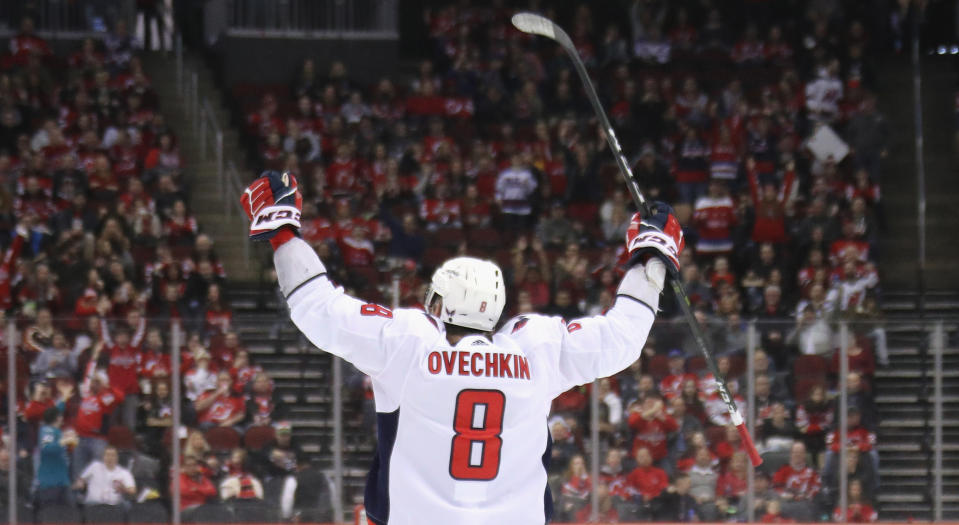 Alex Ovechin's milestone marker, which tied Washington's game against the New Jersey Devils at two on Saturday, was netted in textbook fashion. (Photo by Bruce Bennett/Getty Images)