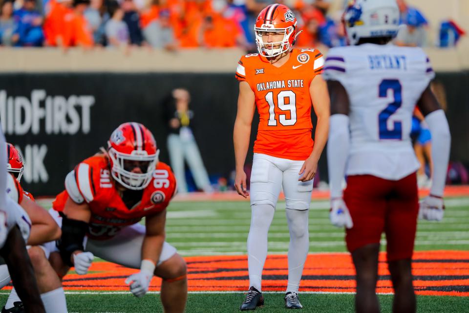 Oct 14, 2023; Stillwater, Oklahoma, USA; Oklahoma State's Alex Hale (19) lines up to kick a field goal during an NCAA football game between Oklahoma State (OSU) and Kansas at Boone Pickens Stadium. Mandatory Credit: Nathan J. Fish-USA TODAY Sports