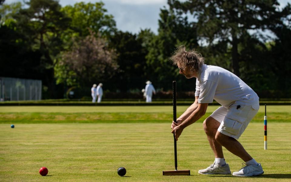 Peterborough and Northampton Croquet Clubs battle it out at Central Park, Peterborough - Adam Hughes / SWNS 