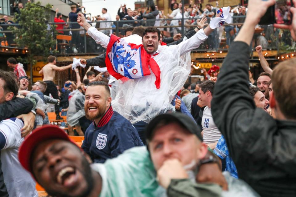 Fans celebrate during the UEFA Euro 2020 round of 16 match between England and Germany at the Vinegar Yard pub in London (Kieran Cleeves/PA) (PA Archive)