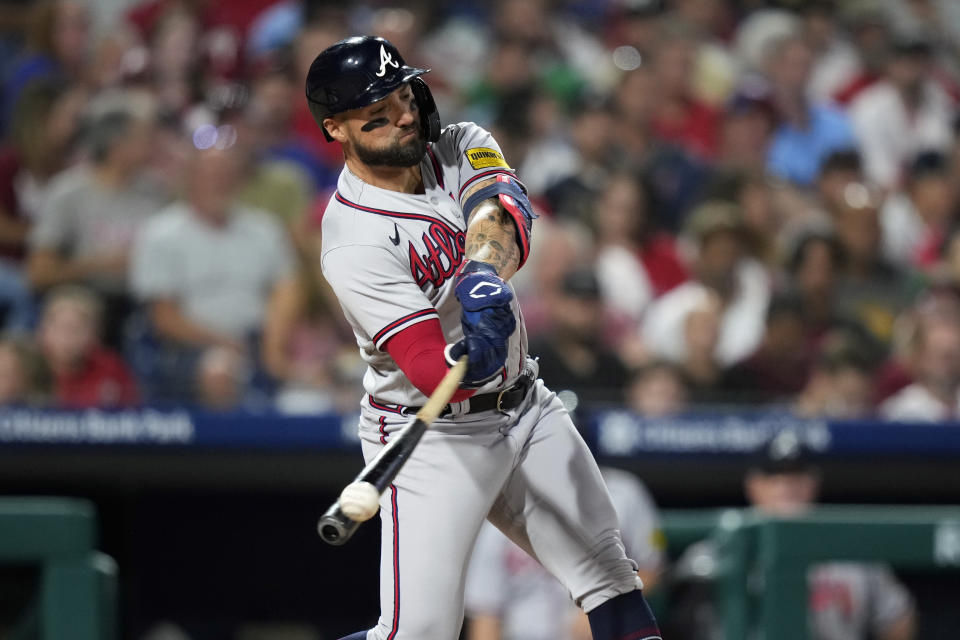 Atlanta Braves' Kevin Pillar hits a run-scoring double against Philadelphia Phillies pitcher Cristopher Sanchez during the fourth inning of a baseball game, Wednesday, Sept. 13, 2023, in Philadelphia. (AP Photo/Matt Slocum)