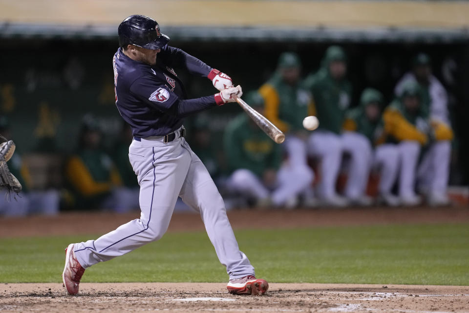 Cleveland Guardians' Myles Straw hits a two-run double against the Oakland Athletics during the fourth inning of a baseball game in Oakland, Calif., Monday, April 3, 2023. (AP Photo/Jeff Chiu)