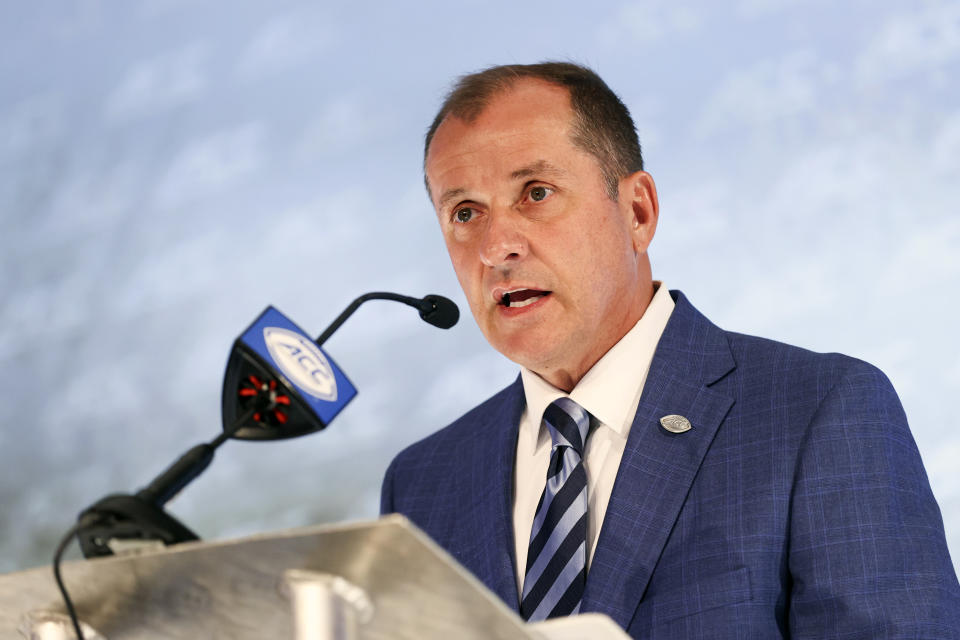 Atlantic Coast Conference commissioner Jim Phillips speaks during the NCAA college football ACC media days in Charlotte, N.C., Wednesday, July 21, 2021. (AP Photo/Nell Redmond)