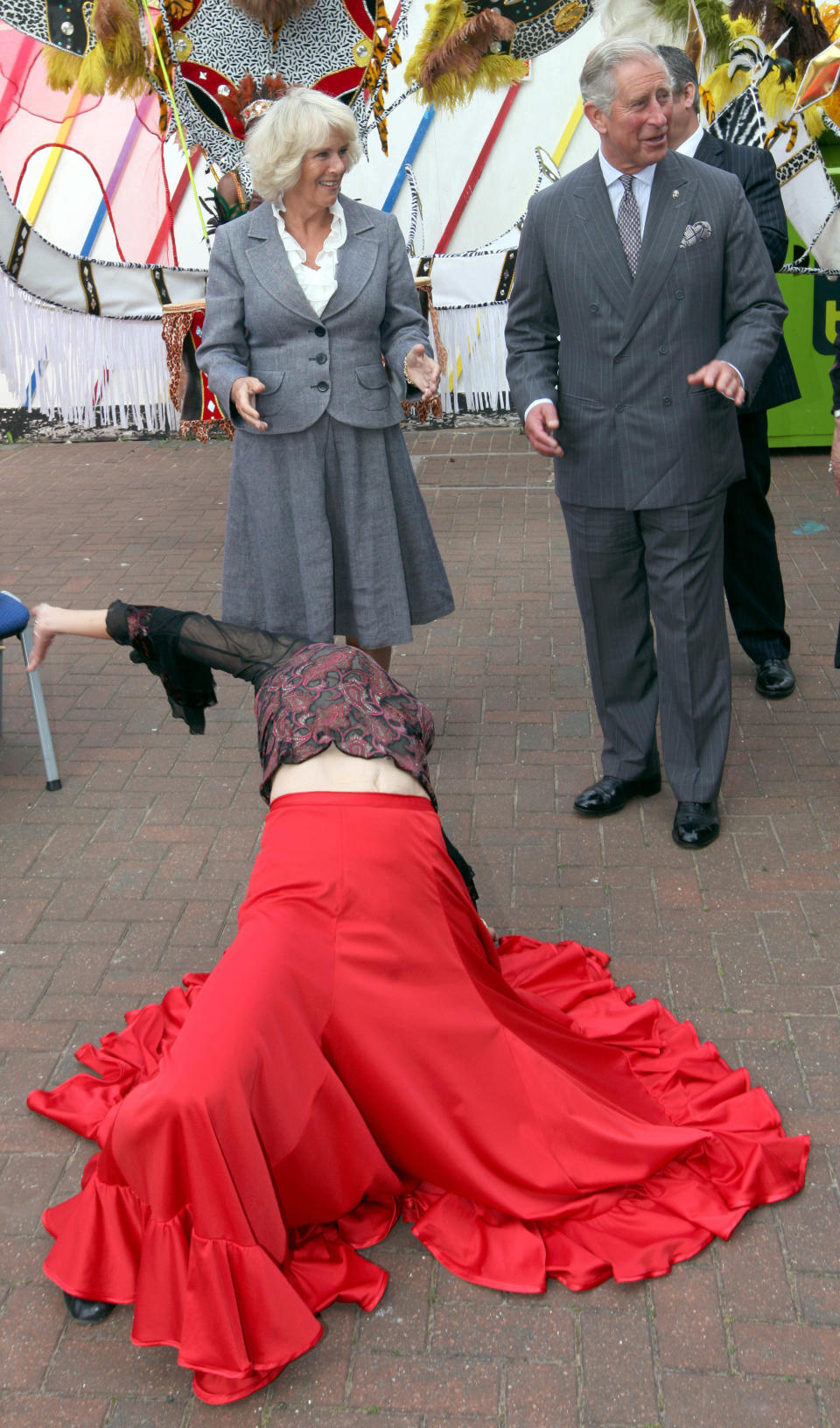 LONDON, UNITED KINGDOM - SEPTEMBER 20:  Prince Charles, Prince of Wales and Camilla, Duchess of Cornwall meet musicians and dancers due to perform at Sunday September 23rd's West Croydon Carnival of Cultures, on September 20, 2012 in Croydon, Greater London, England. The Prince of Wales and Duchess of Cornwall met local residents, shopkeepers, faith leaders and community leaders at Croydon Voluntary Action (CVA) to discuss progress made by members of the community a year on from the August 2011 riots which took place the vicinity.  (Photo by Jon Bond - WPA Pool/Getty Images)