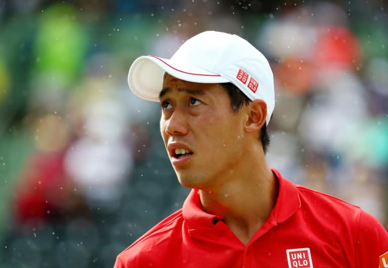 Kei Nishikori of Japan looks on against Kevin Anderson of South Africa during day 5 of the Miami Open March 24, 2017