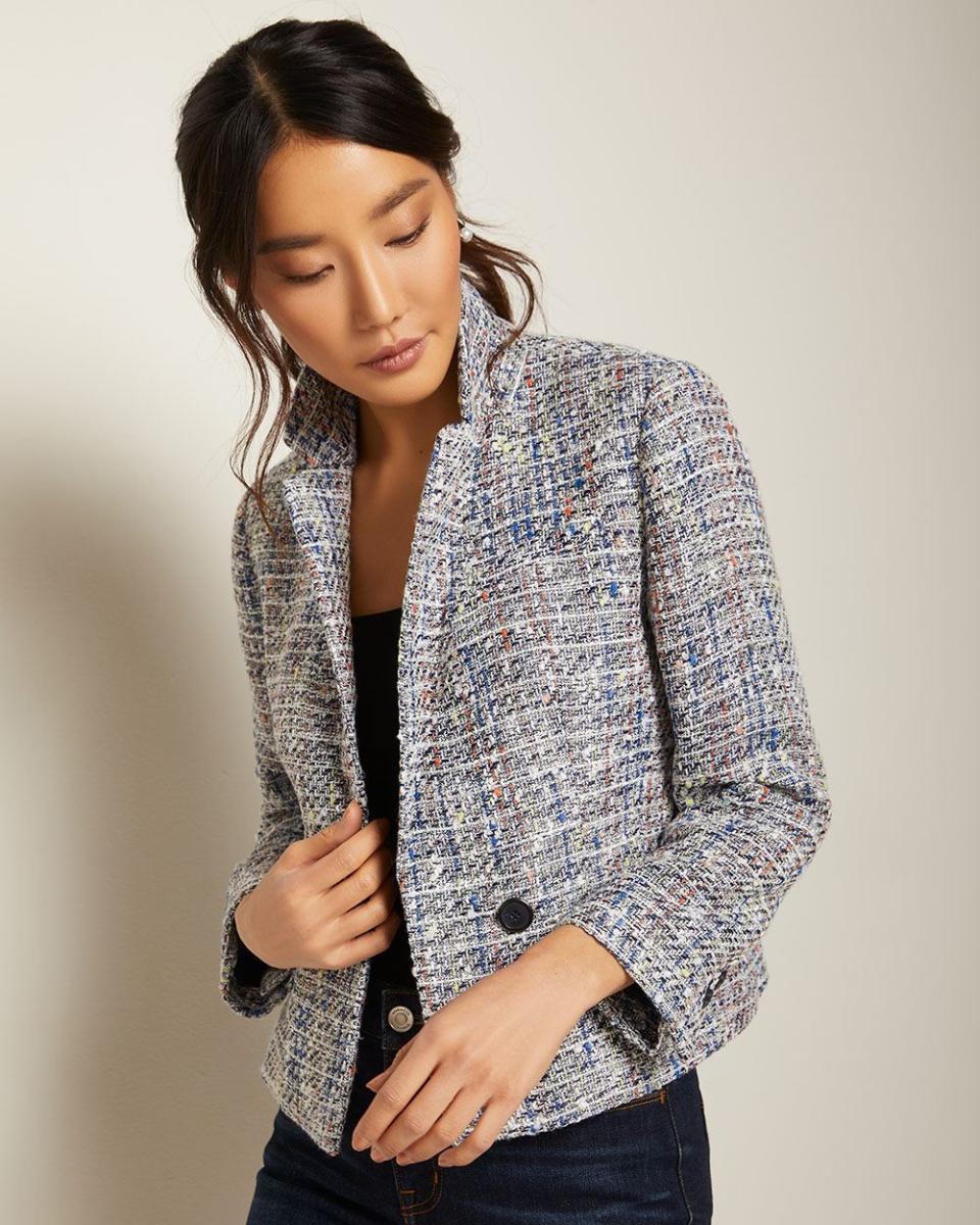 A short, multicolour bouclé blazer.