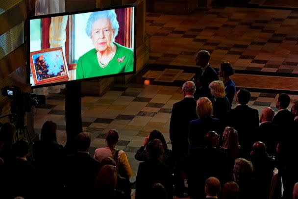 PHOTO: Britain's Queen Elizabeth II appears on a large screen as she makes a video message to attendees of an evening reception to mark the opening day of the COP26 summit, on Nov. 1, 2021, in Glasgow, United Kingdom. (WPA Pool via Getty Images, FILE)