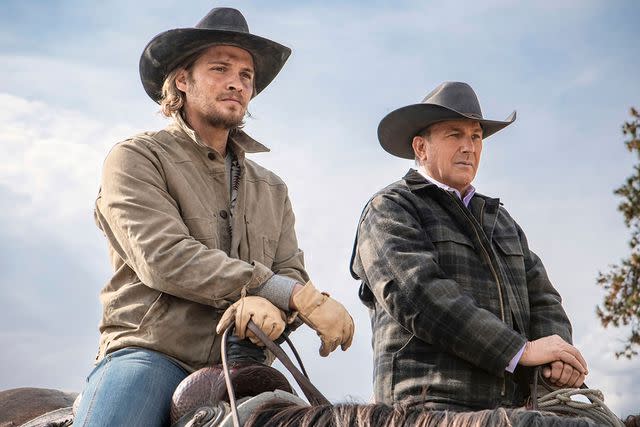 <p>Paramount/Kobal/Shutterstock</p> (L-R) Luke Grimes as Kayce Dutton and Kevin Costner as John Dutton III in 'Yellowstone'