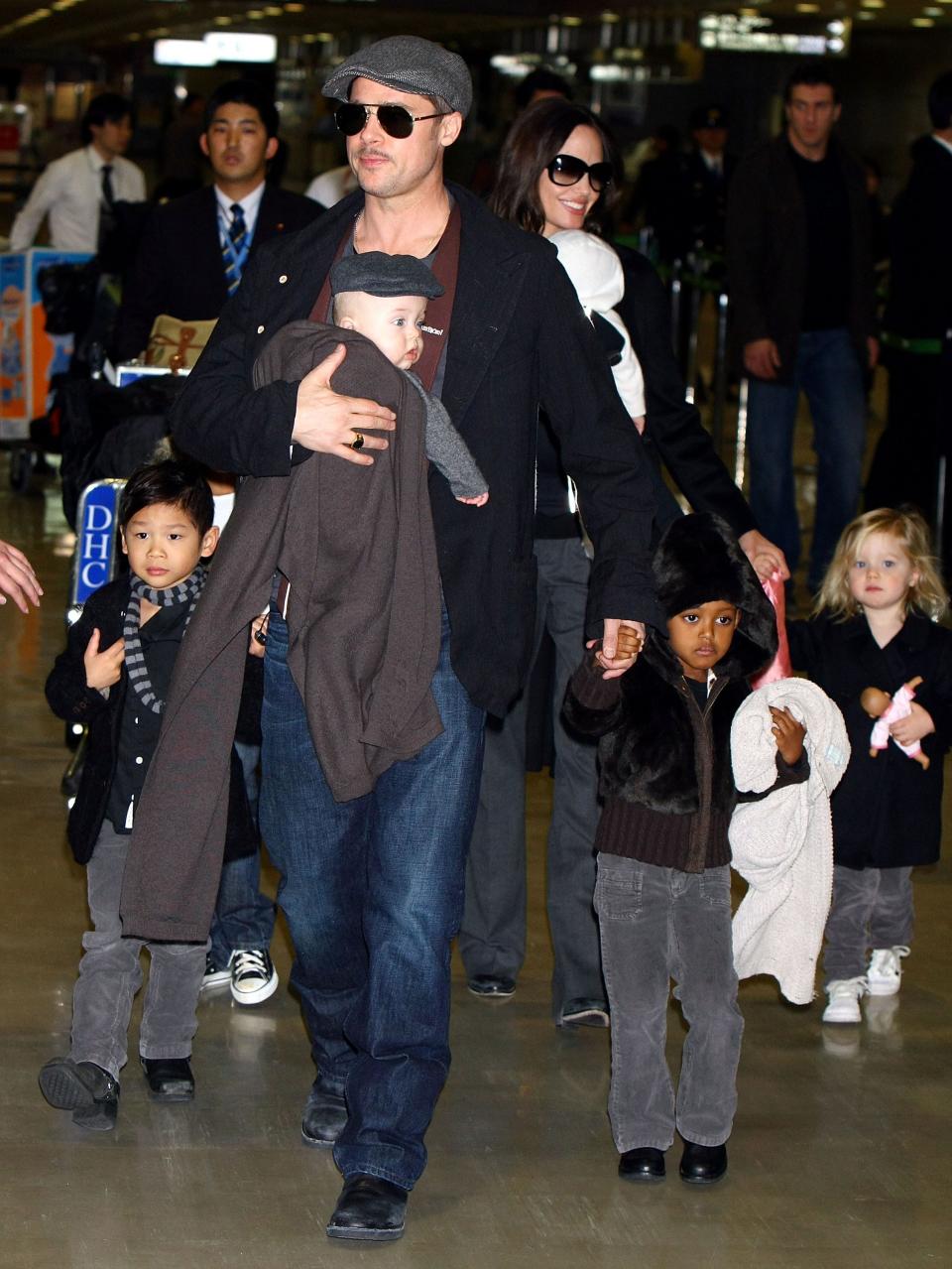 Brad Pitt and Angelina Jolie in Japan with their children, from left, Pax, Knox, Zahara and Shiloh in 2009.