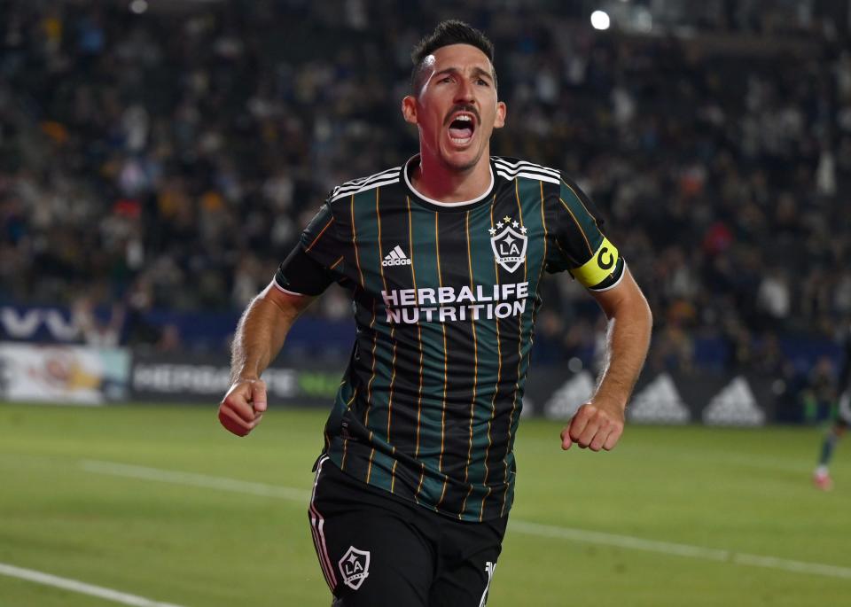 Los Angeles Galaxy midfielder Sacha Kljestan (16) celebrates after scoring a goal in the second half of the game against the Portland Timbers at StubHub Center in 2022. Kljestan retired after that season, but recently returned to the game to play with the Des Moines Menace.