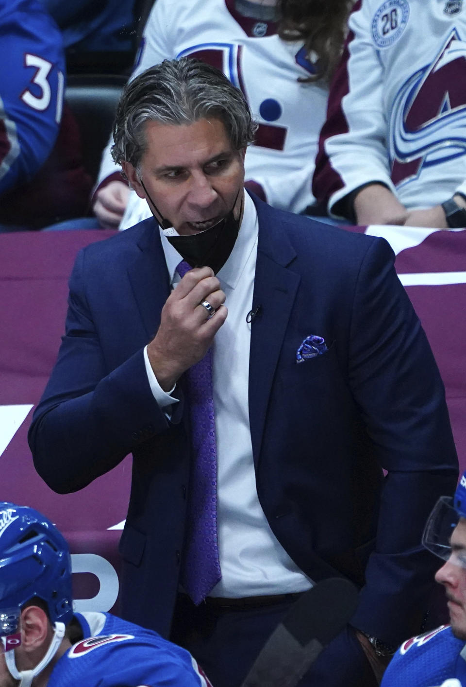 Colorado Avalanche head coach Jared Bednar looks on against the Vegas Golden Knights in the second period of Game 1 of an NHL hockey Stanley Cup second-round playoff series Sunday, May 30, 2021, in Denver. (AP Photo/Jack Dempsey)