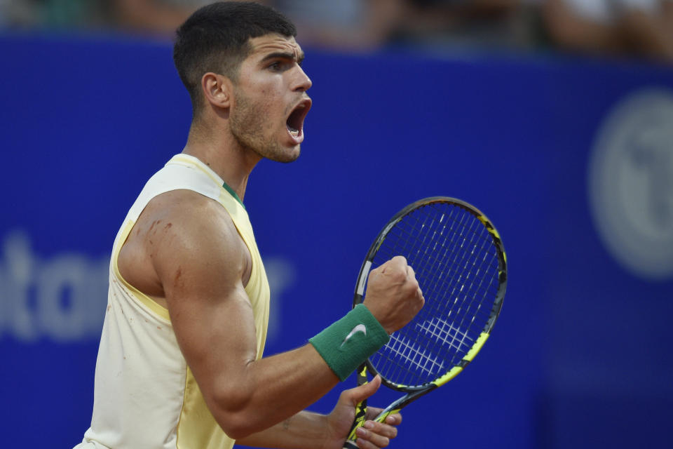 Carlos Alcaraz, of Spain, celebrates a point during an Argentina Open ATP semifinal tennis match against Nicolas Jarry, of Chile, at the Guillermo Vilas Stadium, in Buenos Aires, Argentina, Saturday, Feb. 17, 2024. (AP Photo/Gustavo Garello)