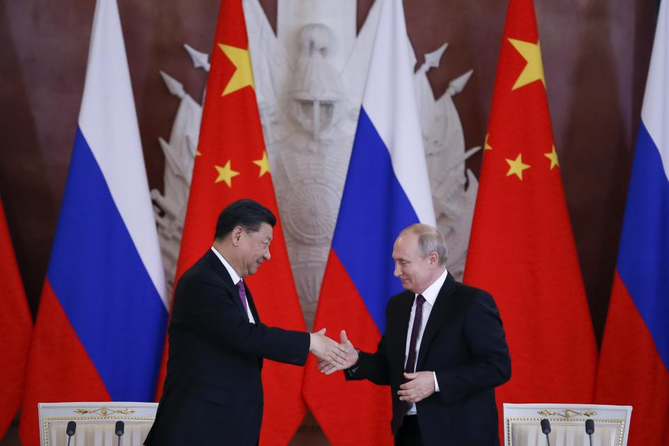 Russian President Vladimir Putin, right, and Chinese President Xi Jinping shake hands after a signing ceremony following their talks in the Kremlin in Moscow, Russia, Wednesday, June 5, 2019. Chinese President Xi Jinping is on visit to Russia this week and is expected to attend Russia's main economic conference in St. Petersburg. (AP Photo/Alexander Zemlianichenko, Pool)