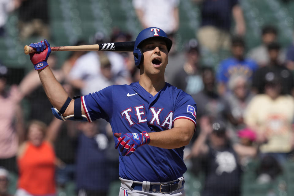 Texas Rangers' Nathaniel Lowe reacts after striking out to end the ninth inning of a baseball game against the Detroit Tigers, Wednesday, May 31, 2023, in Detroit. (AP Photo/Carlos Osorio)