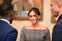 <p>Meghan Markle wears a checkered off-the-shoulder jacket by Theory while visiting Cardiff, Wales. (Photo: Getty Images) </p>