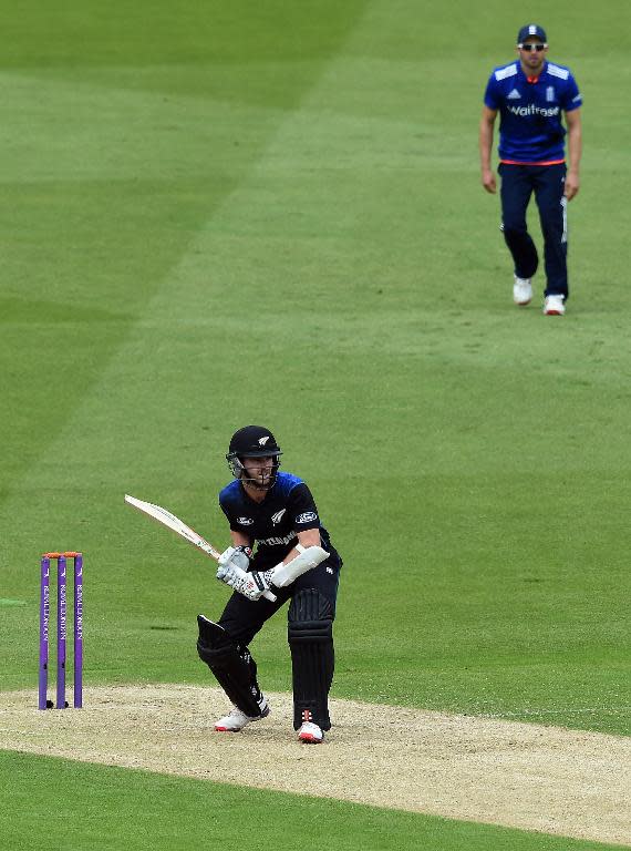 New Zealand's Kane Williamson (L) prepares to bat during their fourth ODI match against England, at Trent Bridge in Nottingham, on June 17, 2015