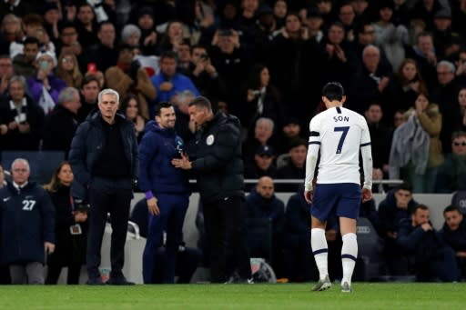 Son Heung-min trudges off after receiving a red card for his challenge on Chelsea's Antonio Rudiger