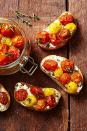 <p>Add a spoonful of this four-ingredient confit onto crusty bread slices for a tasty bruschetta.</p><p>Get the <a href="https://www.goodhousekeeping.com/food-recipes/a45216/cherry-tomato-confit-recipe/" rel="nofollow noopener" target="_blank" data-ylk="slk:Cherry Tomato Confit recipe" class="link "><strong>Cherry Tomato Confit recipe</strong></a>.</p>