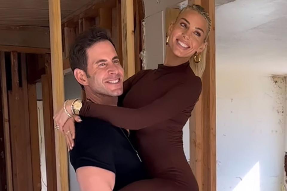 <p>Heather Rae El Moussa/Instagram</p> Heather Rae and Tarek El Moussa strike a cheeky pose during photoshoot on Wednesday.