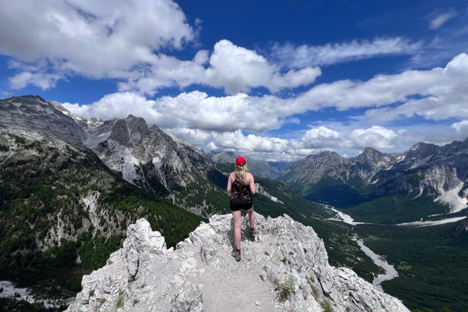 The author reaches the top of the Valbona Pass (Laura Sanders)