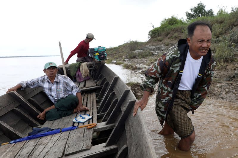 Than Zaw Oo makes his way on to Hintha Kyun island where he used to farm rice before it collapsed into the river in Mawlamyine