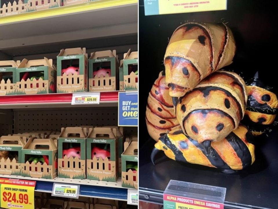 Red pepper figurines in their box next to a wasp sculpture.