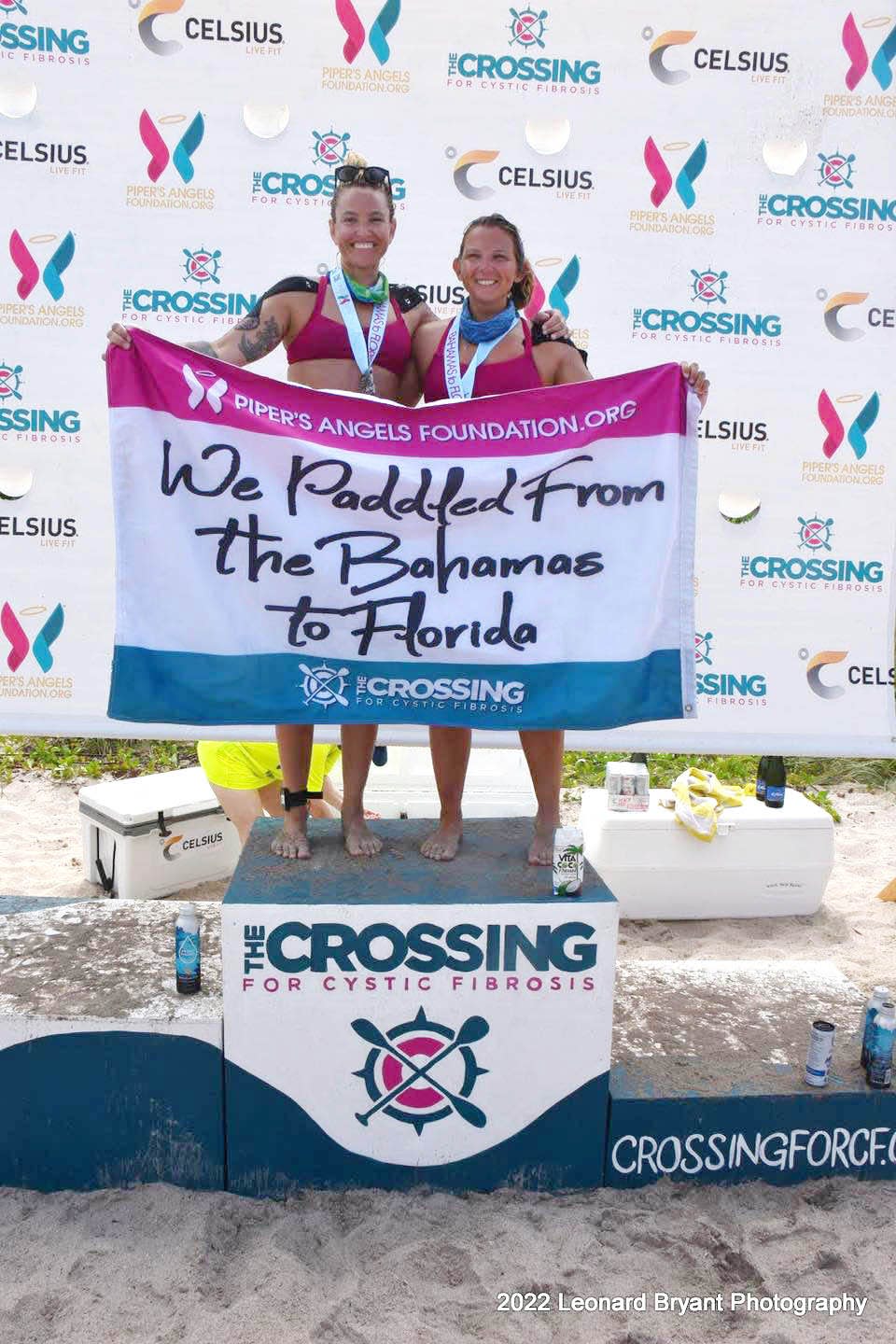Holly Heidenreich, right, a firefighter and EMT with the Destin Fire Control District, and her teammate, Megan Scully from Lake Worth, pose for a picture after paddling 80 miles from Bimini, Bahamas to the mainland of Florida in last month's 2022 Crossing For Cystic Fibrosis challenge.
