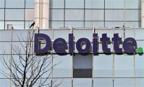 FILE PHOTO: The Deloitte Company logo is seen on a commercial tower at Gurgaon, on the outskirts of New Delhi