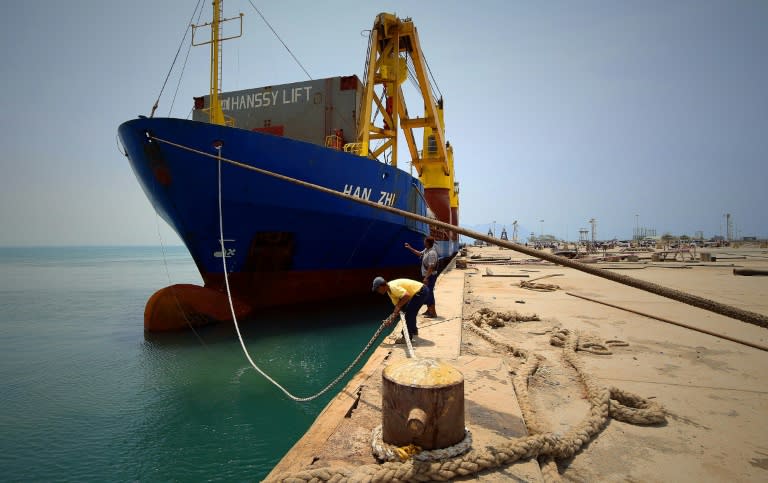 A picture released by the World Food Programme (WFP) shows a UN aid ship docked in Yemen's devastated port city of Aden on July 21, 2015