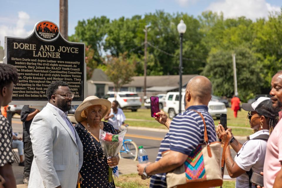 Civil rights activist Joyce Ladner, a Hattiesburg native, and John Spann, Mississippi Humanities Council's program and outreach director, pose for a photo Friday after the unveiling of a Freedom Trail marker noting Ladner and her sister Dorie Ladner's contributions to advocating for civil rights in Mississippi.