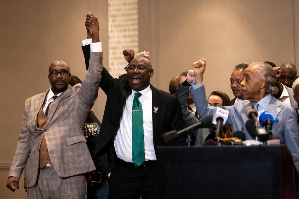 George Floyd's brother Philonise Floyd, left,  with family attorney Ben Crump and Rev. Al Sharpton following the verdict in the Derek Chauvin trial.