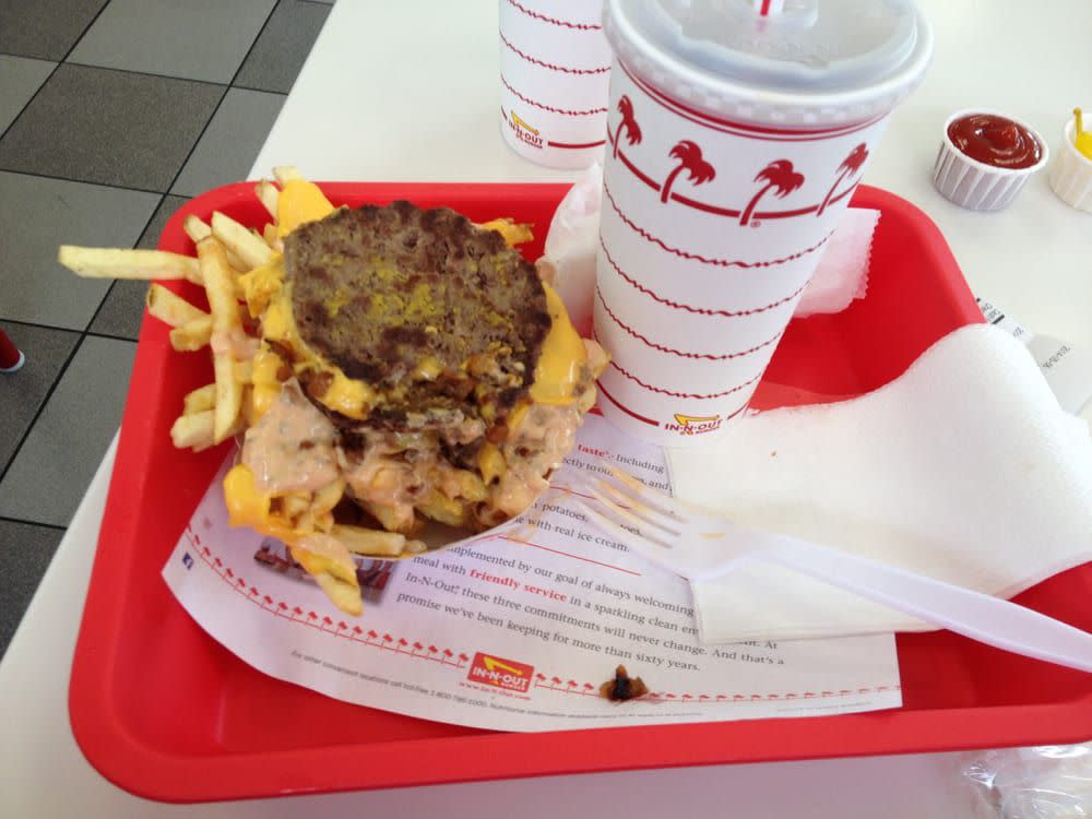 Roadkill Fries from In-N-Out. Fries topped with sauce, cheese, caramelized onions, and hamburger.