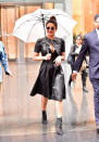 Proving you needn't wait until winter to pull off the trend, Priyanka Chopra took to the streets of New York in a leather bow-emblazoned dress - the perfect rain-proof look if you ask us. <em>[Photo: Getty]</em>