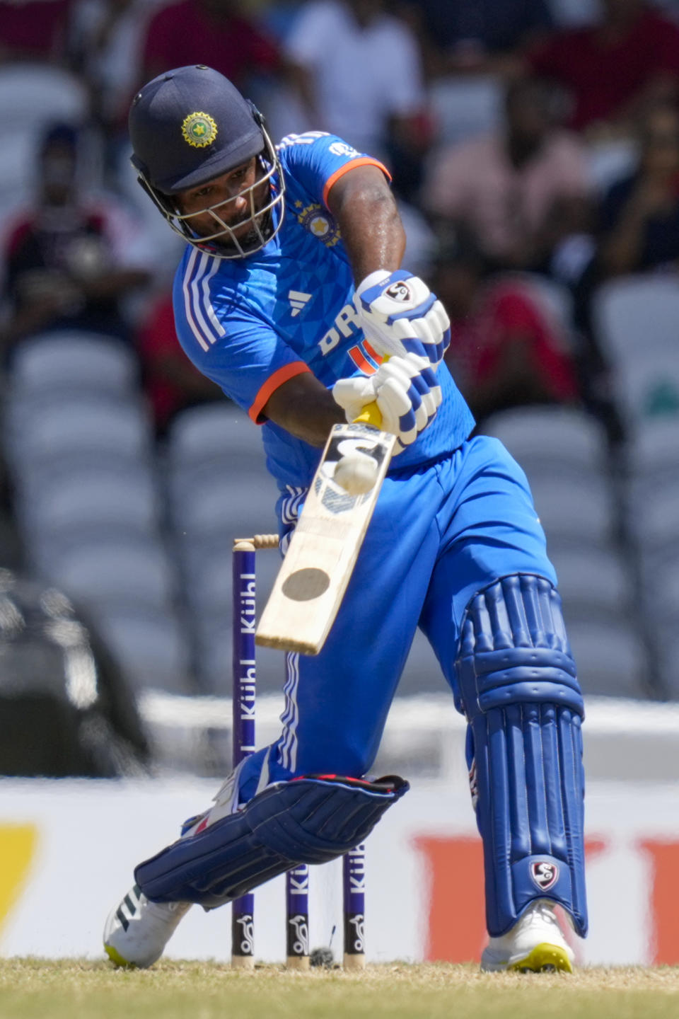India's captain Hardik Pandya plays a shot against West Indies during their first T20 cricket match at the Brian Lara Stadium in Tarouba, Trinidad and Tobago, Thursday, Aug. 3, 2023. (AP Photo/Ramon Espinosa)