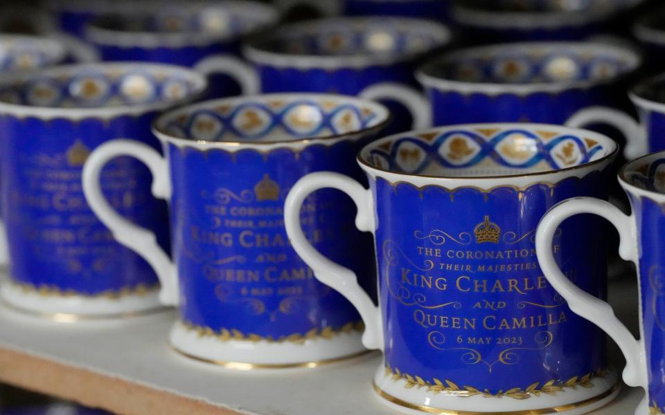 Official chinaware is seen on a shelf at a pottery factory in Stoke-on-Trent where the official Coronation chinaware is produced on behalf of Royal Collection Trust - Frank Augstein/PA Wire