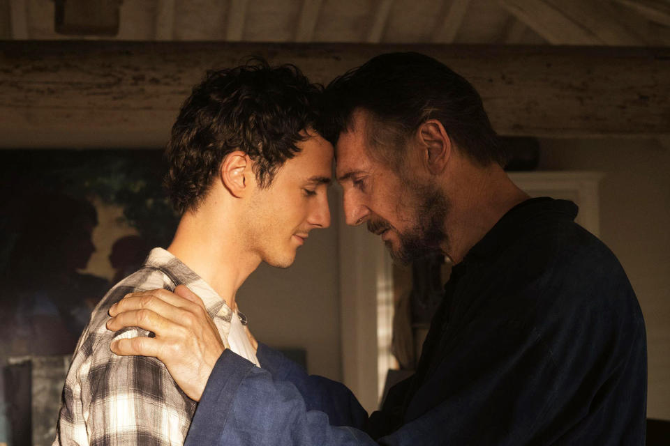 This image released by IFC Films shows Michaél Richardson, left, and his father Liam Neeson in a scene from "Made In Italy." They play father and son in the film but their characters are dealing with the loss of their wife and mother. Neeson's wife and Richardson's mother, Natasha Richardson, died over a decade ago in a skiing accident. (IFC Films via AP)