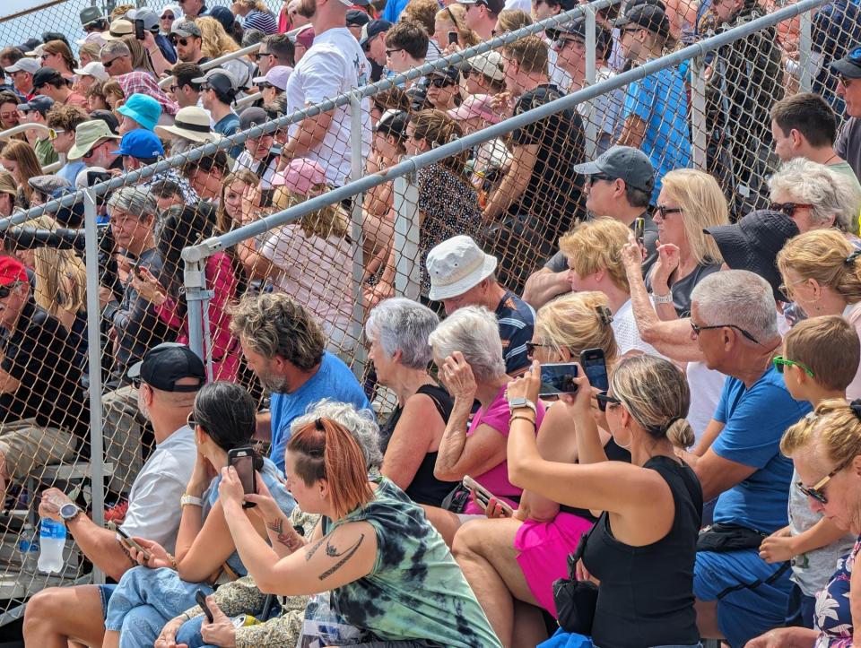 With minutes until liftoff, visitors at the Kennedy Space Center Visitor Complex had their eyes on the skies and phones in hand ready to record the historic moment.