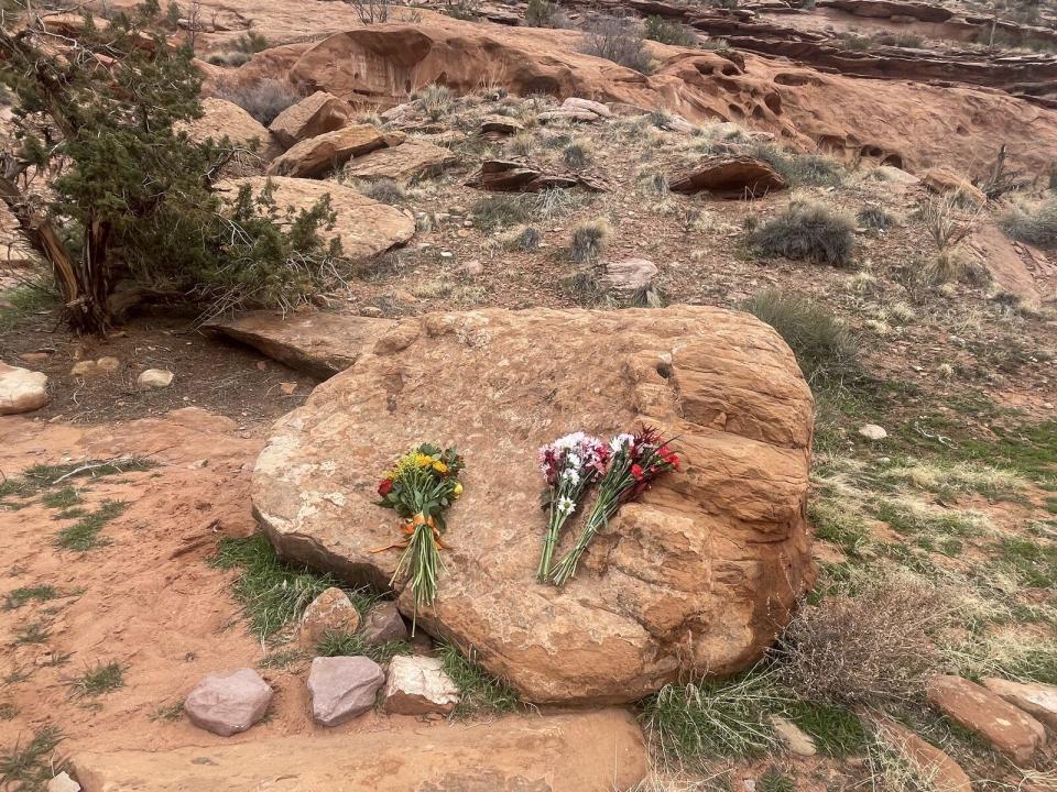 People placed flowers along the hiking trail in Moab, Utah, where 17-year-old Zoe McKinney fell to her death on Friday afternoon. / Credit: Arielle Harrison, KUTV