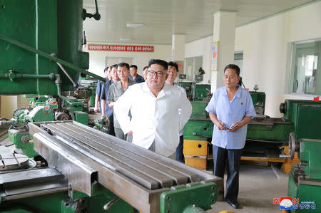 North Korean Leader Kim Jong Un inspected the Myohyangsan Medical Appliances Factory in this undated photo released by North Korea's Korean Central News Agency (KCNA) on August 21, 2018. KCNA via REUTERS