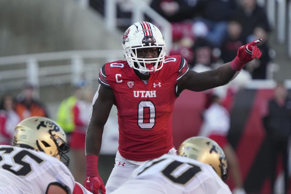 Utah linebacker Devin Lloyd (0 ) readies for a play in the second half of the team's NCAA college football game against Colorado on Nov. 26, 2021, in Salt Lake City. Lloyd was selected by the Jacksonville Jaguars during the first round of the NFL Draft Thursday, April 28. [George Frey/AP Photo/File]