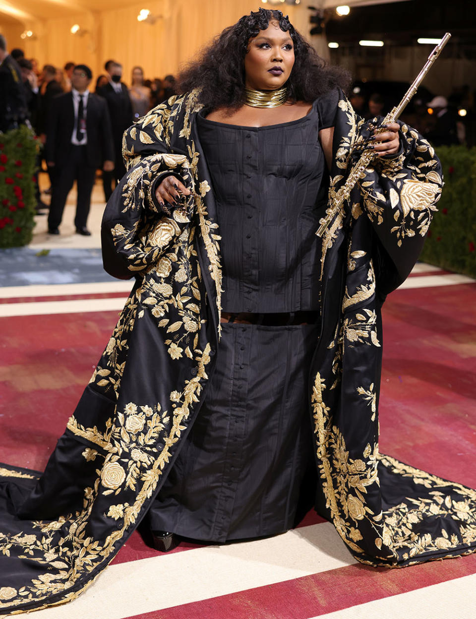 Lizzo attends at the Met Gala in Thom Browne. - Credit: John Shearer/Getty Images