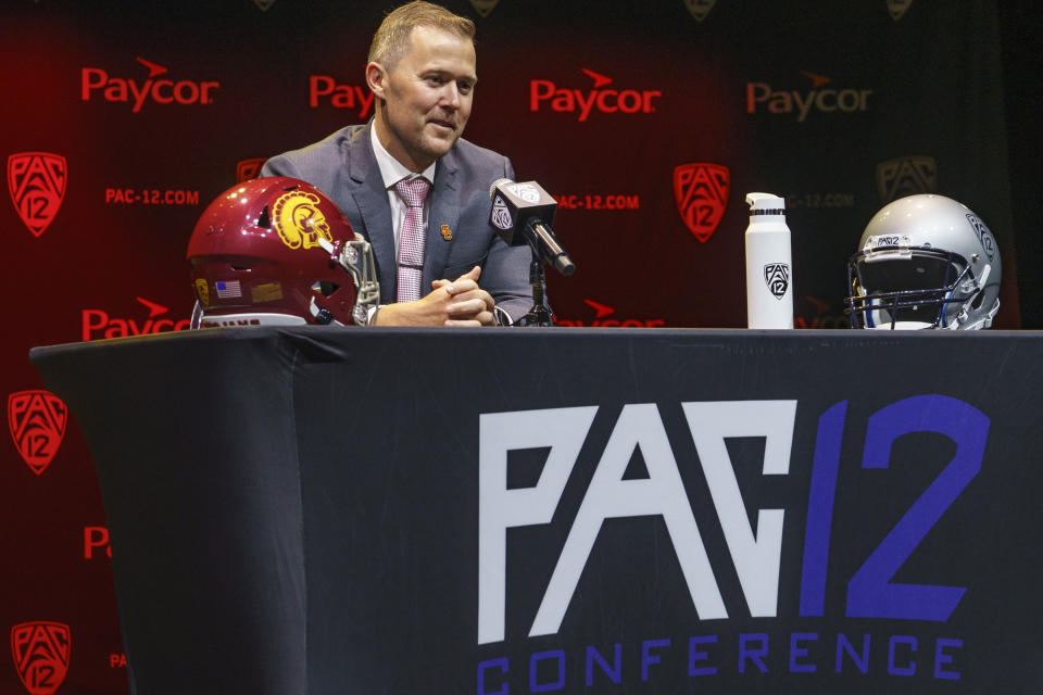 FILE - Southern California coach Lincoln Riley speaks during the Pac-12 Conference NCAA college football media day on July 29, 2022, in Los Angeles. Riley left Oklahoma after a four-year stint as Oklahoma’s coach to replace Clay Helton, who was fired early in the 2021 season. USC and UCLA are leaving the Pac-12 after this season for the Big Ten. (AP Photo/Damian Dovarganes, File)