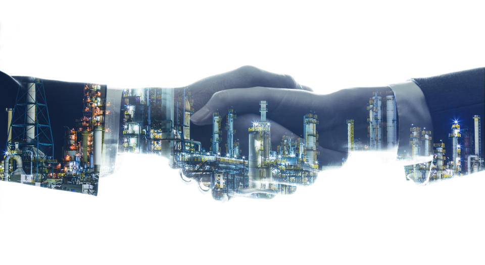 An energy complex in the form of two people shaking hands.