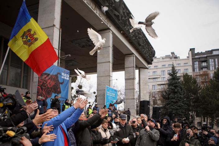 Members of Moldova's recently-formed Movement for the People group and Moldova's Russia-friendly Shor Party (AP)