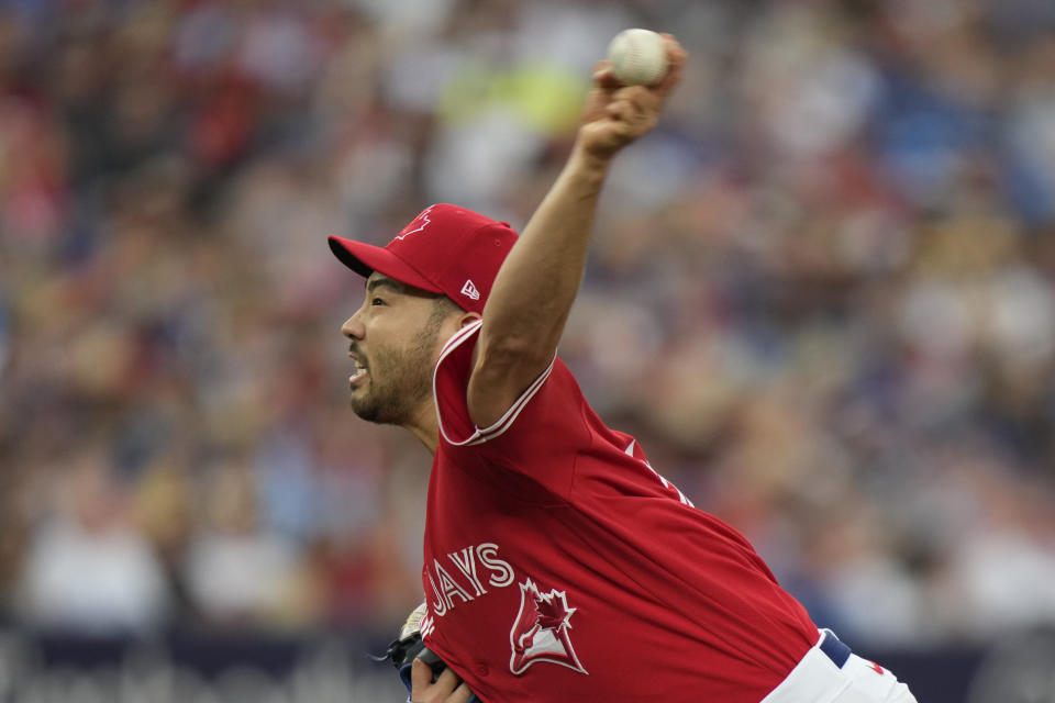 Toronto Blue Jays starting pitcher Yusei Kikuchi (16) throws during the first inning of a baseball game against the Boston Red Sox in Toronto, Saturday, July 1, 2023. (Frank Gunn/The Canadian Press via AP)