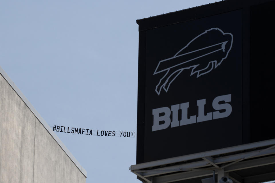 A Buffalo Bills fan funded airplane with a message of support flies overhead Bills Stadium before an NFL football game between the Buffalo Bills and the Los Angeles Rams, Sunday, Sept. 27, 2020, in Orchard Park, N.Y. The Mafia is becoming legitimate in Buffalo — the Bills Mafia that is. The Bills last week filed an application to trademark its fanbase’s adopted nickname in preparation to launch a series of branded merchandise and apparel available at its team store and sold online. (AP Photo/Brett Carlsen)