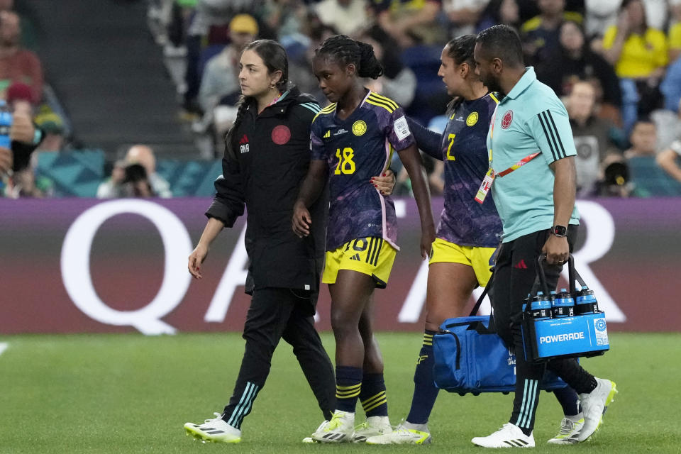 Colombia's Manuela Vanegas, center right, speaks to teammate Linda Caicedo as she leaves the pitch to be substituted during the Women's World Cup Group H soccer match between Germany and Colombia at the Sydney Football Stadium in Sydney, Australia, Sunday, July 30, 2023. Vanessa and Caicedo both scored.in Colombia's 2-1 win. (AP Photo/Mark Baker)